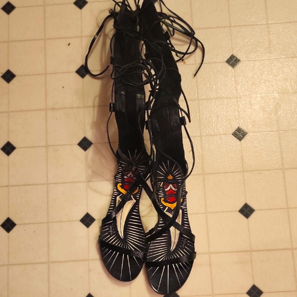 Taylor says gladiator sandals (rare)